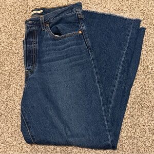 Levi's Ribcage Jeans. Wide Leg bottoms with cropped and frayed cuff. Size 30